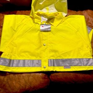 Brand new rain Jacket and pants never worn has tags high visibility